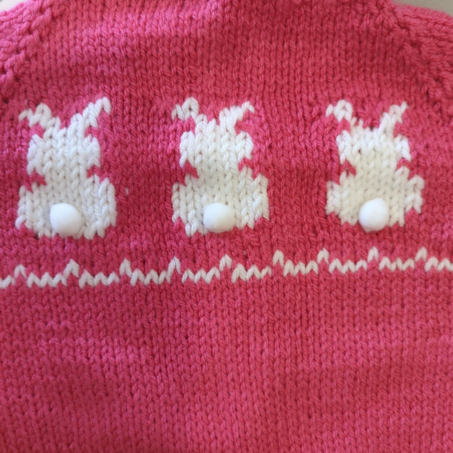 Hand knit baby sweaters