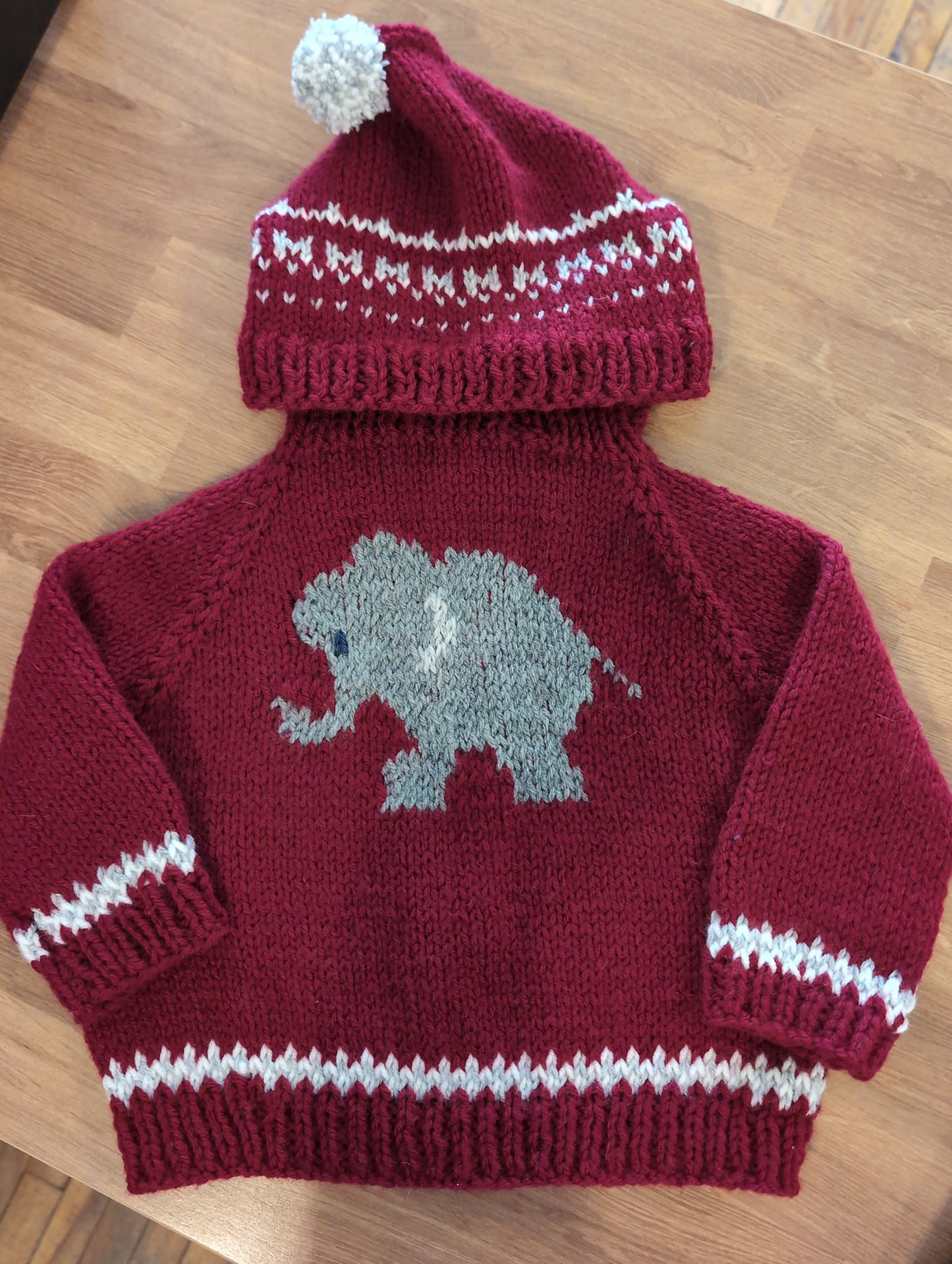 Hand knit baby sweaters