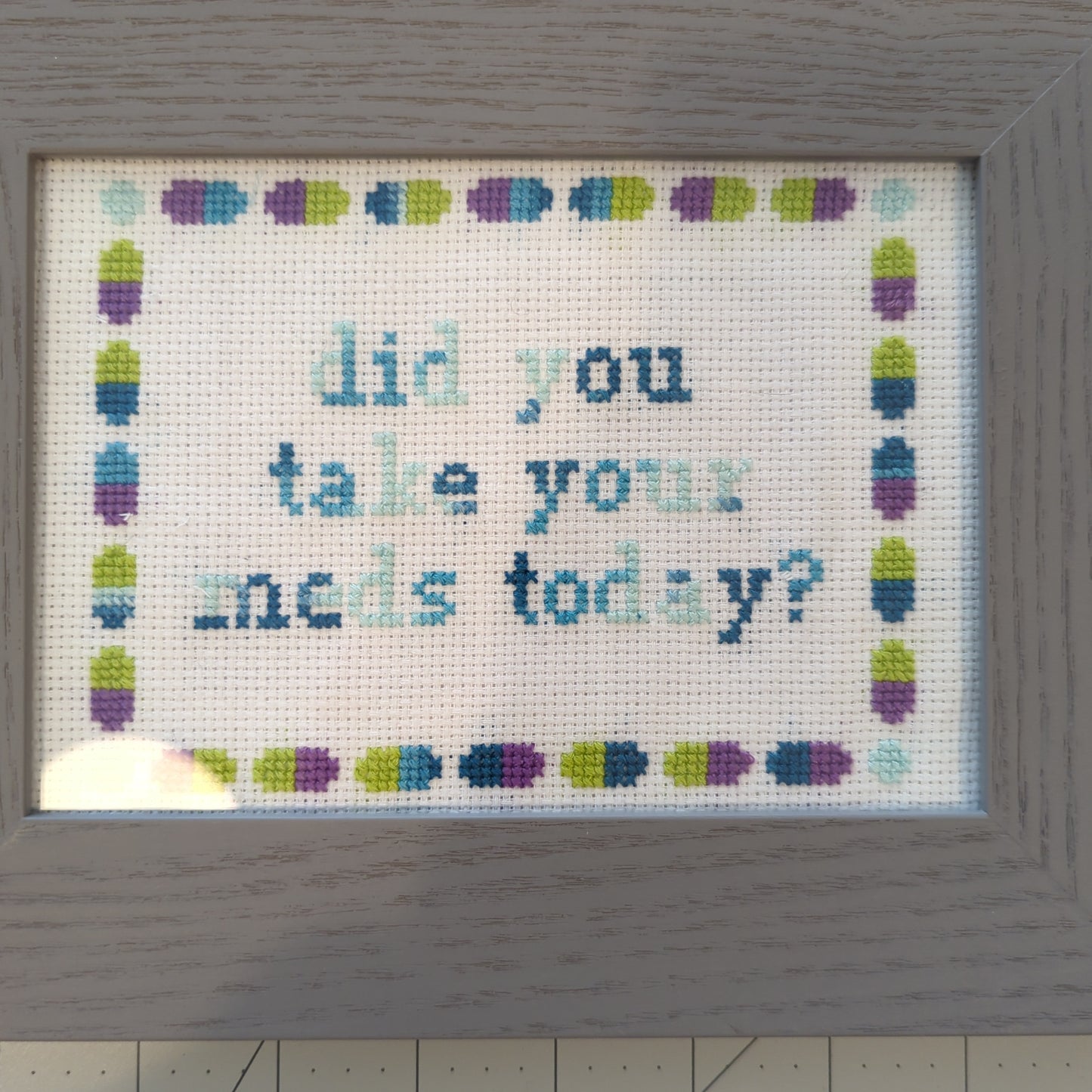 Framed cross stitch