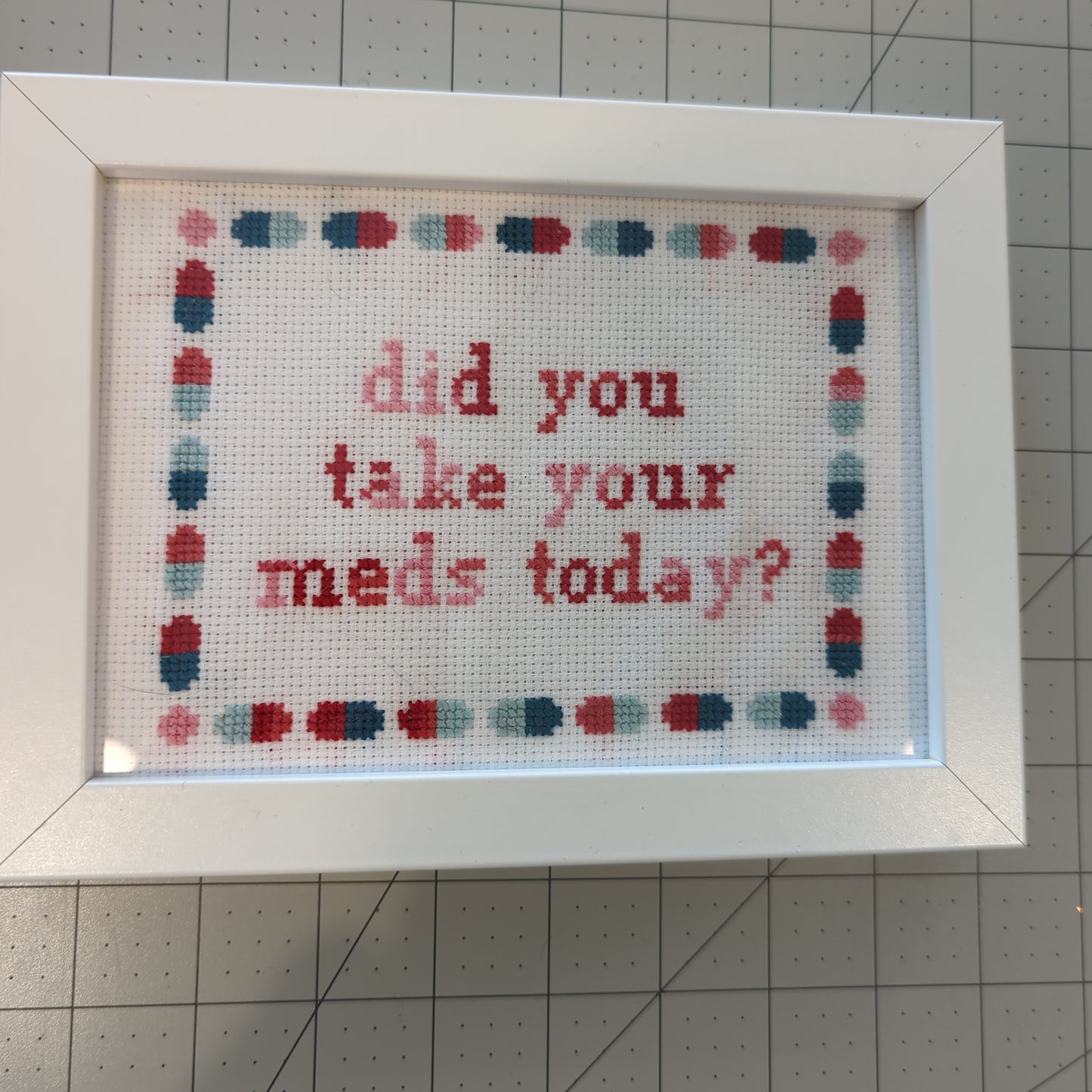 Framed cross stitch