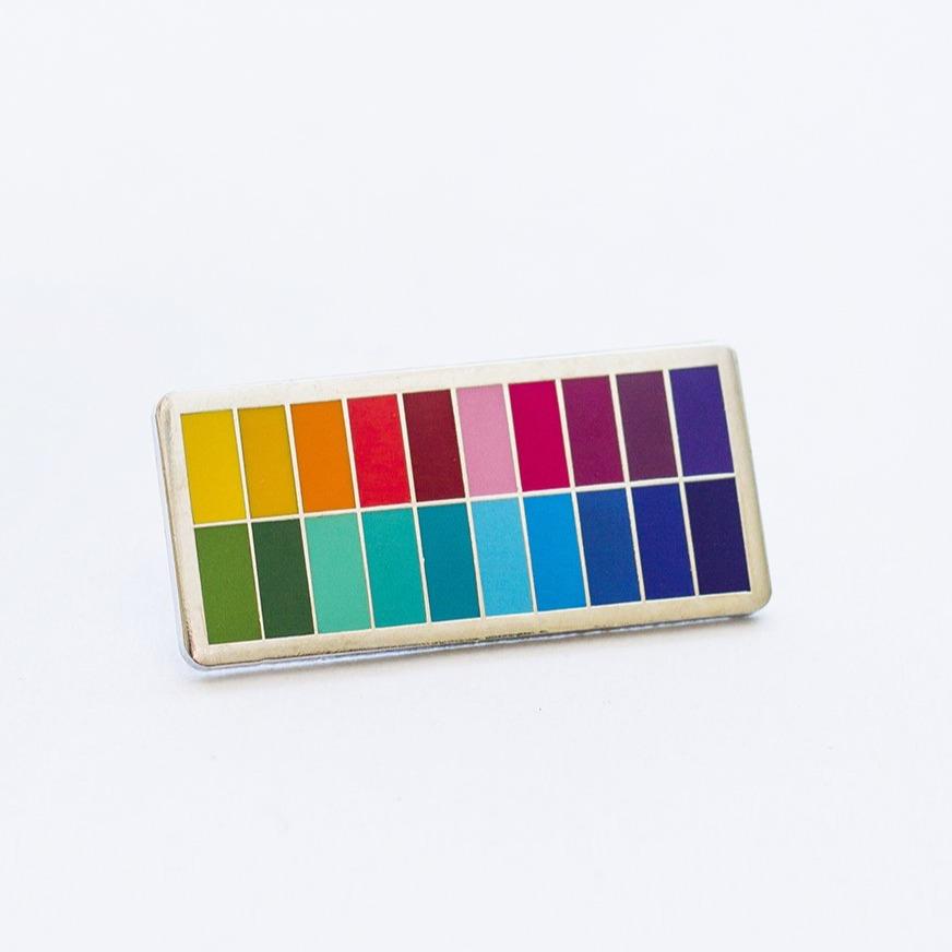 Gray Muse enamel pins