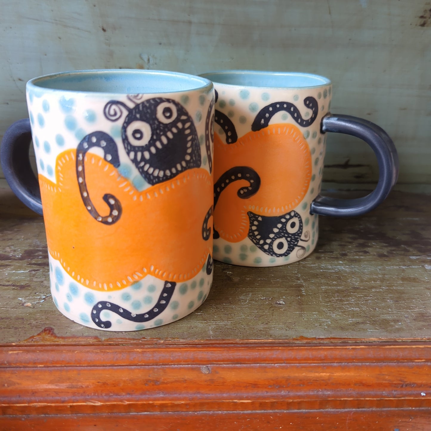 Maine monster mugs with handles