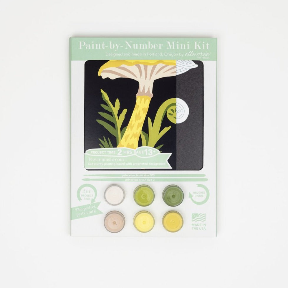 A paint by number kit of a yellow and green fawn mushroom