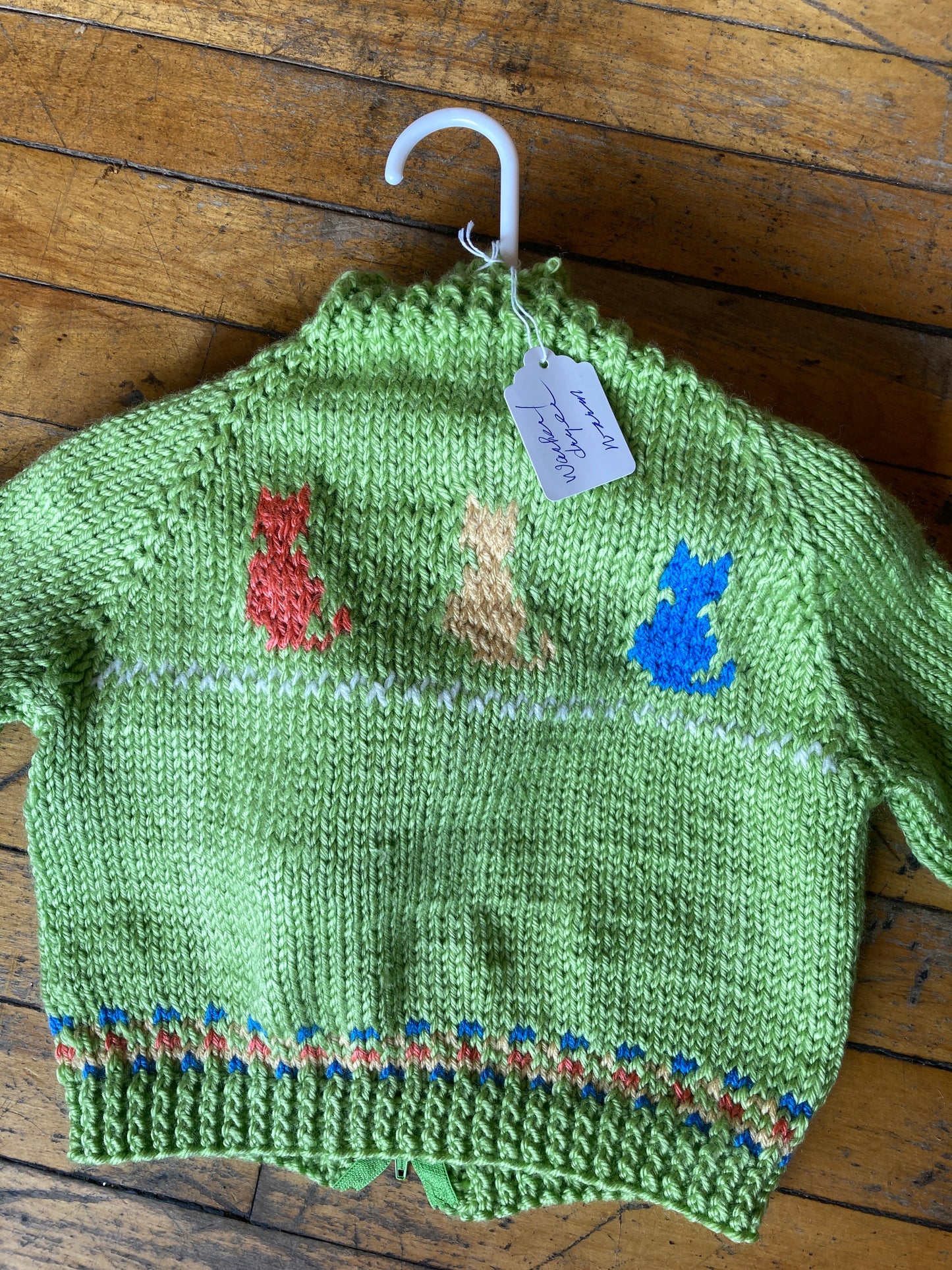 Hand knit baby sweaters