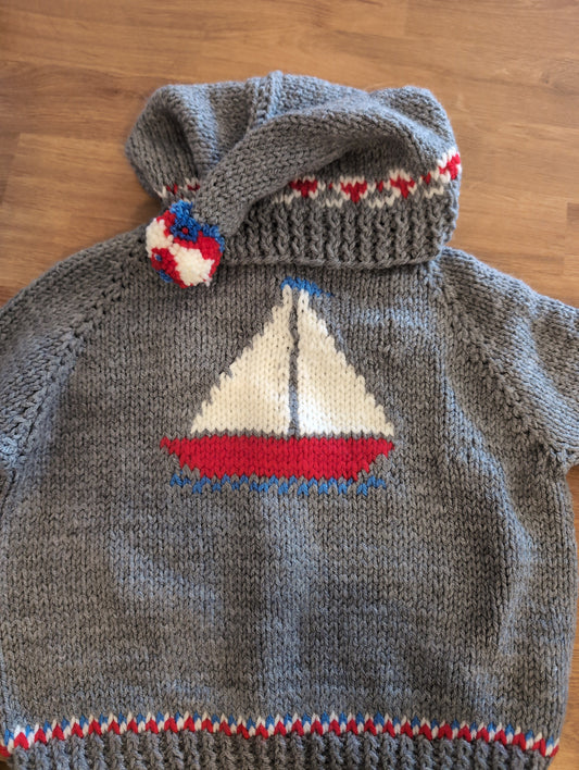 Hand knit baby sweaters