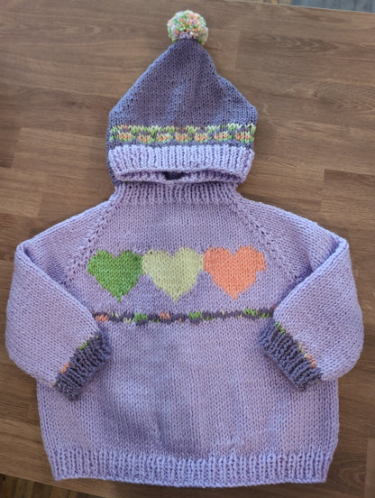 Hand knit baby sweaters