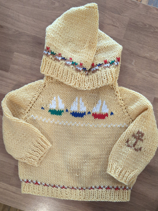 Hand knit baby sweaters